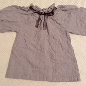 Girl’s gray shirt with bow neck design